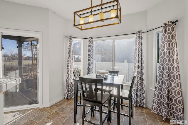 dining room with a wealth of natural light