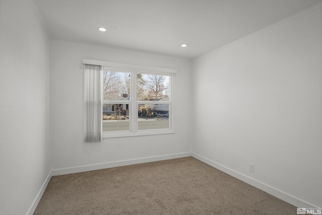 carpeted empty room with ornamental molding