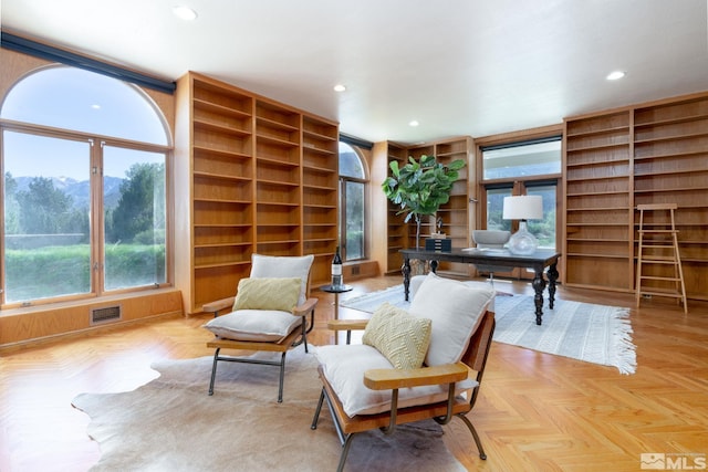 sitting room featuring light parquet floors