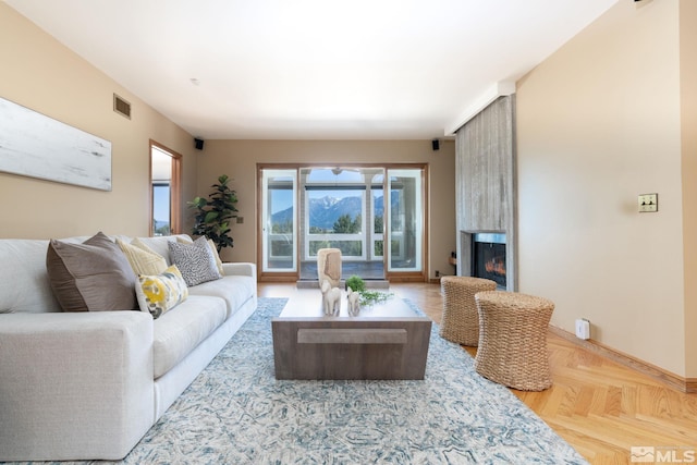 living room with light parquet floors