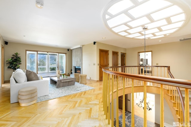 corridor with light parquet floors