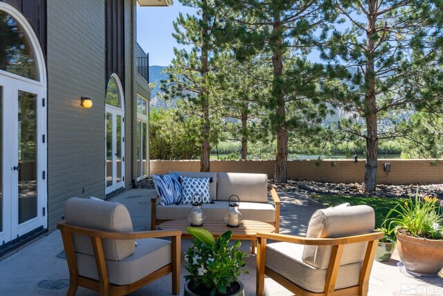 view of patio featuring french doors and an outdoor hangout area