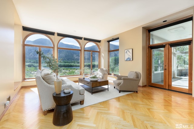 living room with french doors and light parquet floors