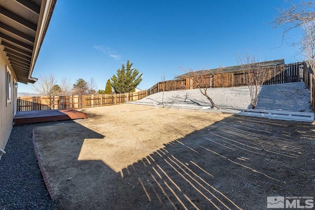 view of yard featuring a deck