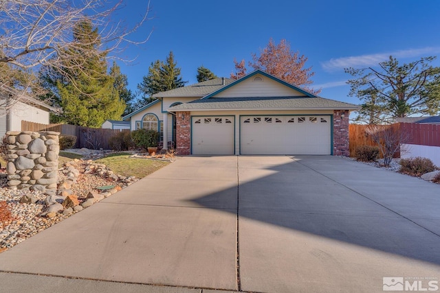 ranch-style home featuring a garage