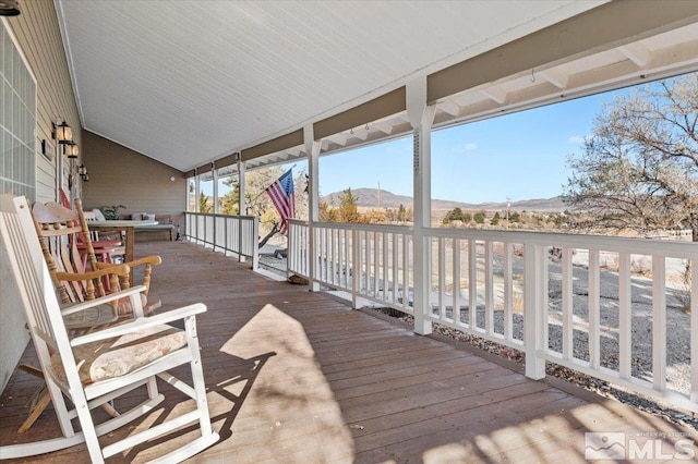 deck with a mountain view