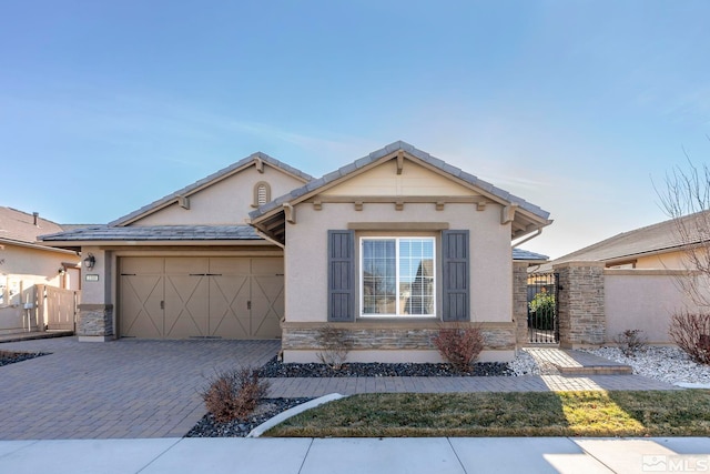 view of front of property featuring a garage