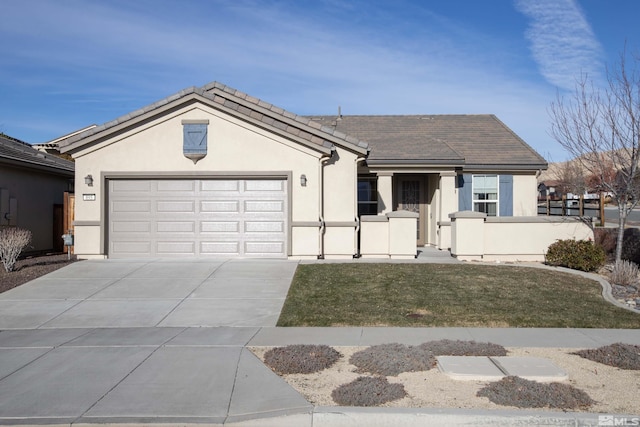 ranch-style home featuring a garage