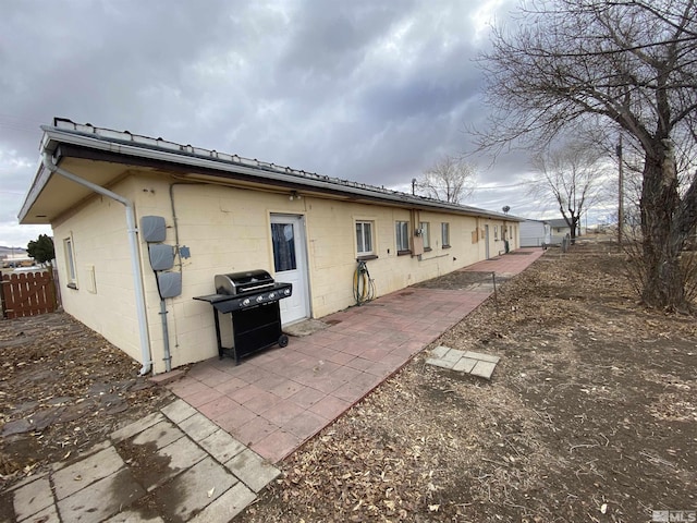 rear view of property with a patio