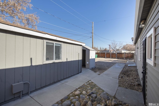 view of side of property featuring a patio