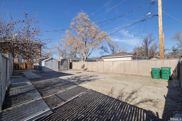 view of yard with a storage shed