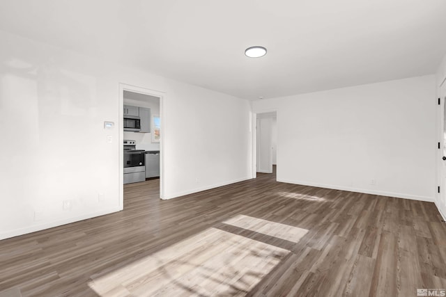 empty room featuring hardwood / wood-style floors