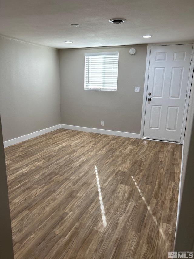 foyer entrance with hardwood / wood-style flooring