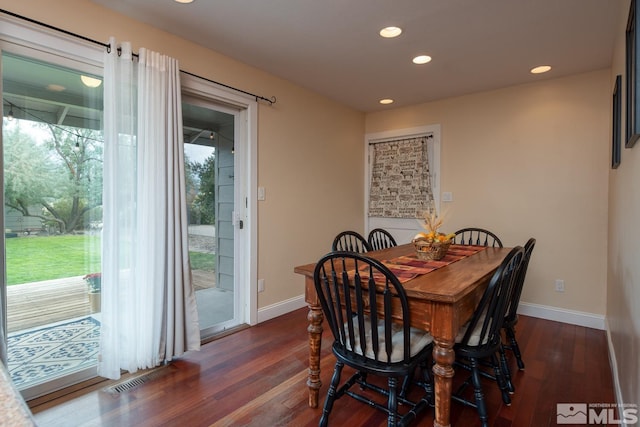 dining room featuring dark wood-type flooring