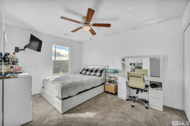 bedroom featuring light carpet and ceiling fan