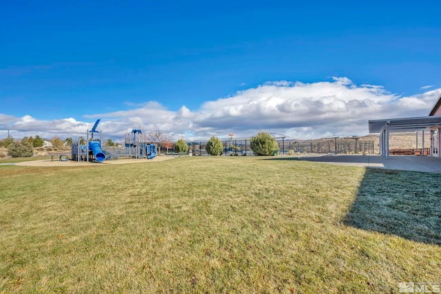 view of yard featuring a playground