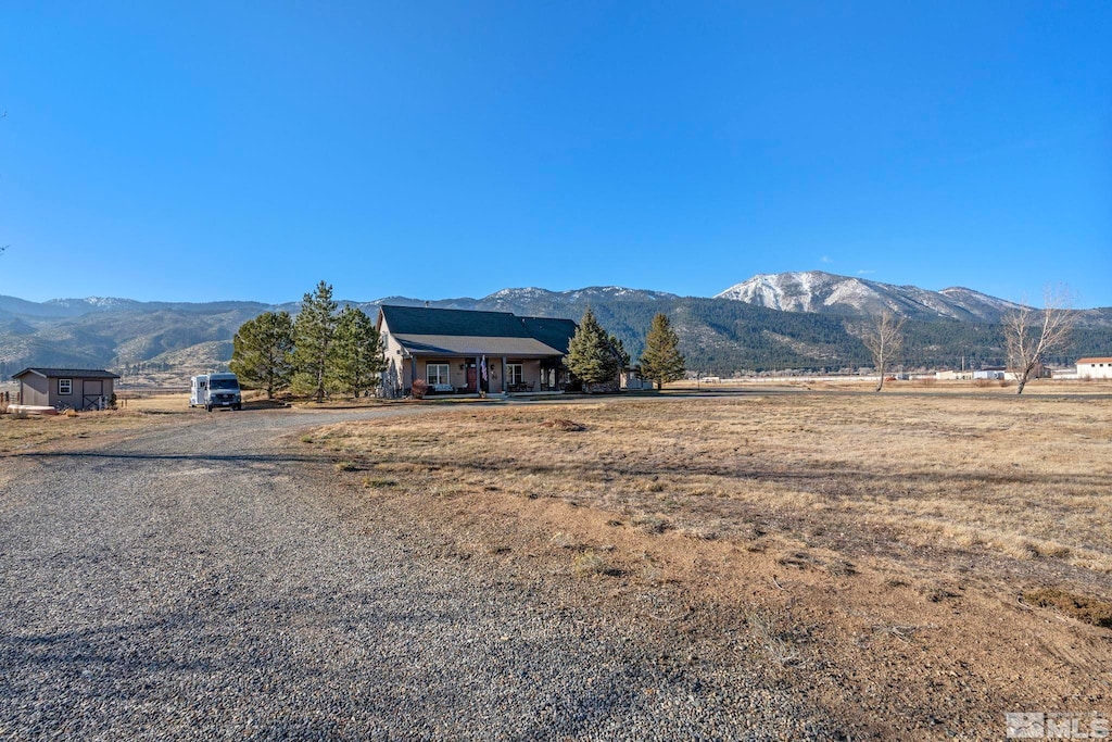 view of mountain feature featuring a rural view