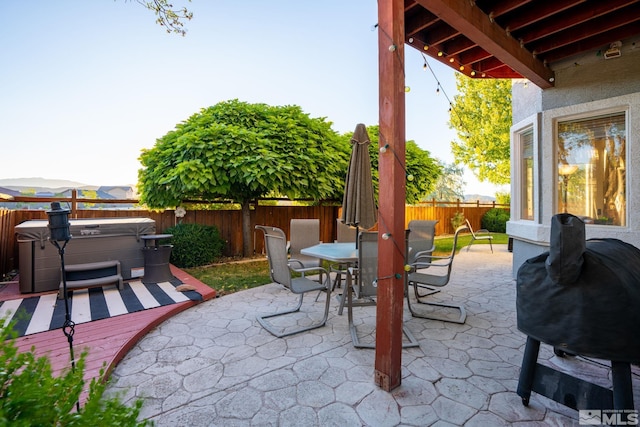 view of patio featuring a hot tub