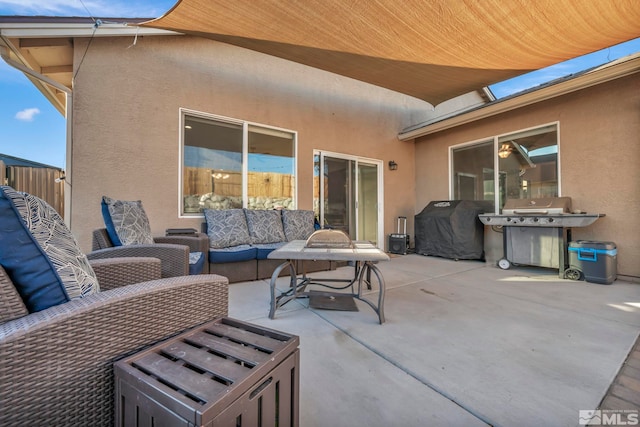 view of patio featuring a grill and outdoor lounge area