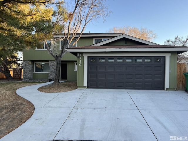 view of front of property featuring a garage