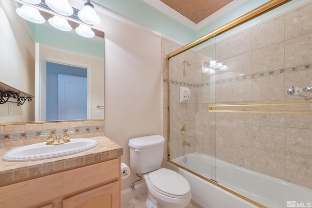 full bathroom with crown molding, toilet, vanity, and combined bath / shower with glass door