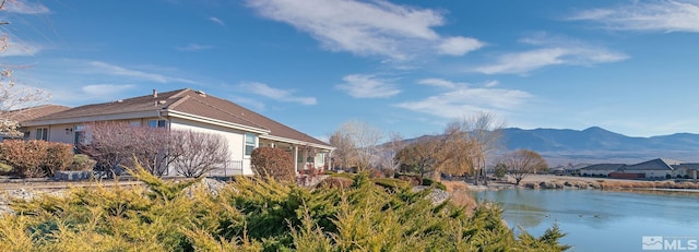 exterior space with a mountain view