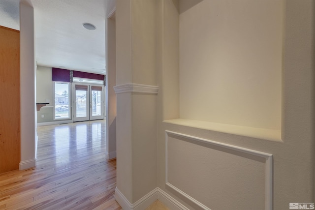 hallway featuring light hardwood / wood-style flooring