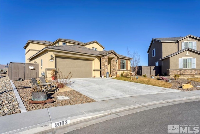 view of front of home with a garage