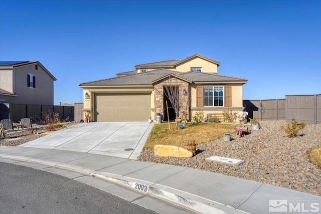 view of front of property featuring a garage