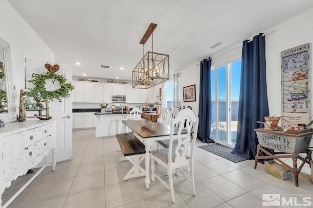 view of tiled dining space