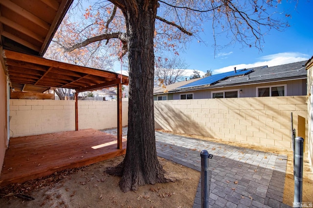 view of yard featuring a wooden deck