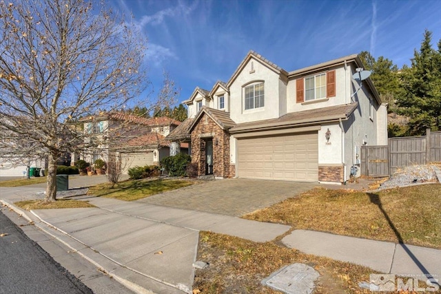 view of front of home with a garage