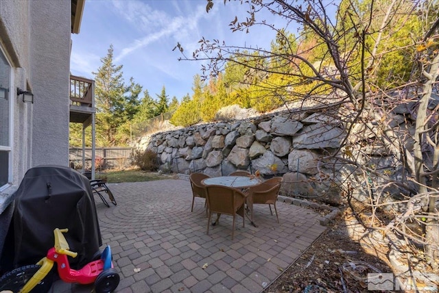 view of patio with a grill