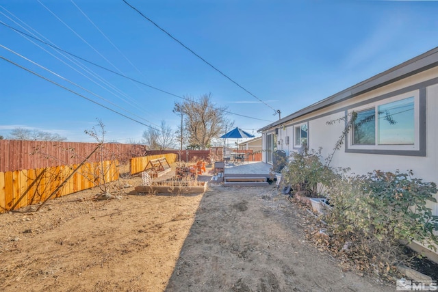 view of yard with a deck