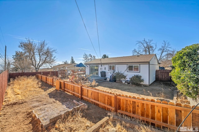 back of property with a patio area