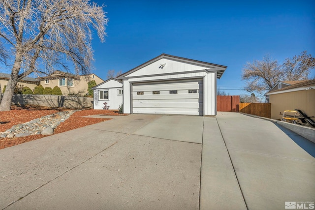 ranch-style home with a garage