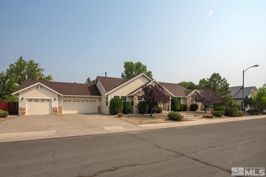 single story home with a garage