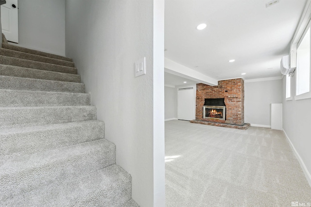 stairway featuring carpet, beam ceiling, a fireplace, and crown molding