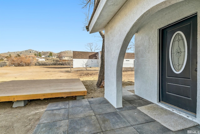 property entrance featuring a mountain view