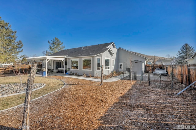 rear view of property with a patio area