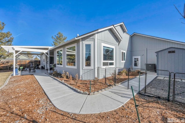 view of side of home featuring a patio