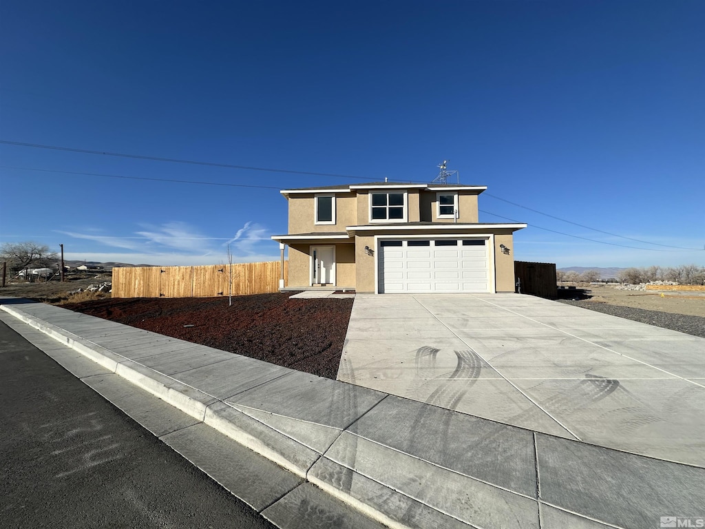 view of front of home featuring a garage