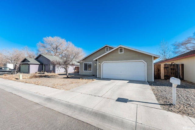 ranch-style house featuring a garage