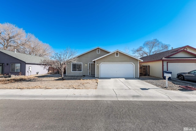 ranch-style house featuring a garage