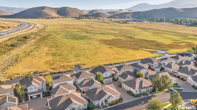 bird's eye view with a mountain view