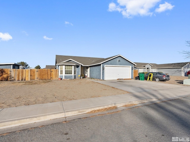 ranch-style home with a garage