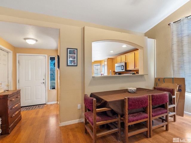 dining room featuring light hardwood / wood-style floors