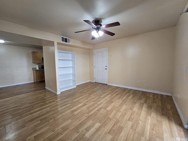 interior space featuring ceiling fan and light hardwood / wood-style flooring