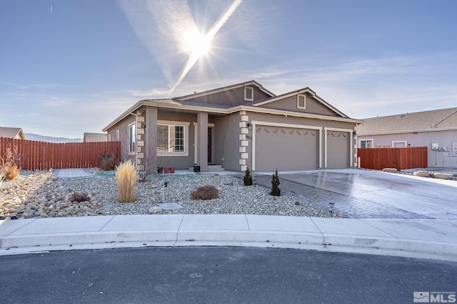 view of front of property featuring a garage