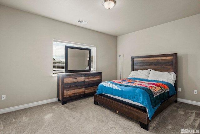 bedroom with light carpet